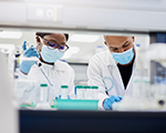 two young scientists conducting medical research in a laboratory