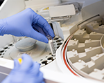 Blood analysis in centrifuge machine in laboratory