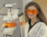 Student at microscope 150x120px